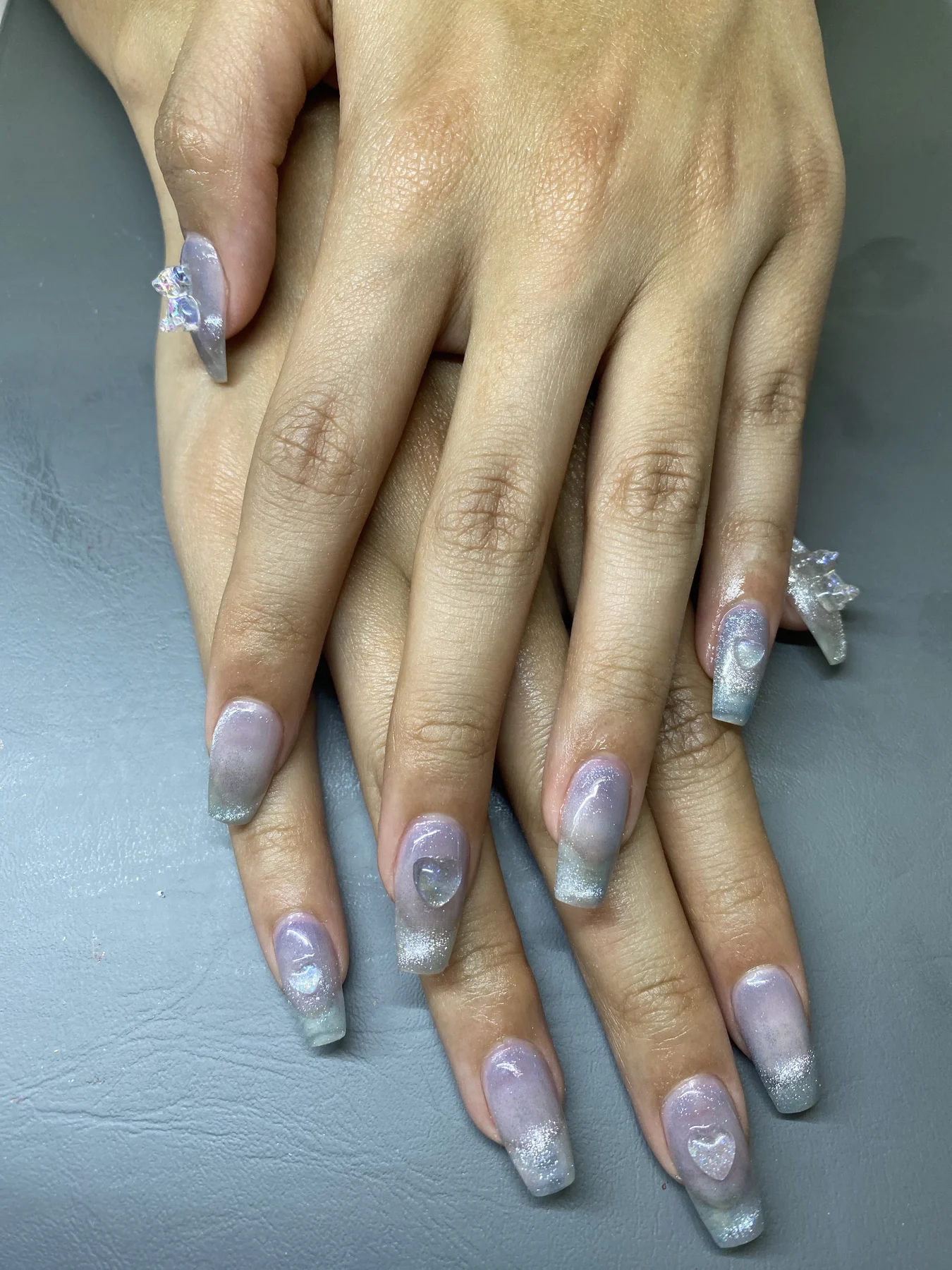 Lilac-and-silver ombre nails with star charms